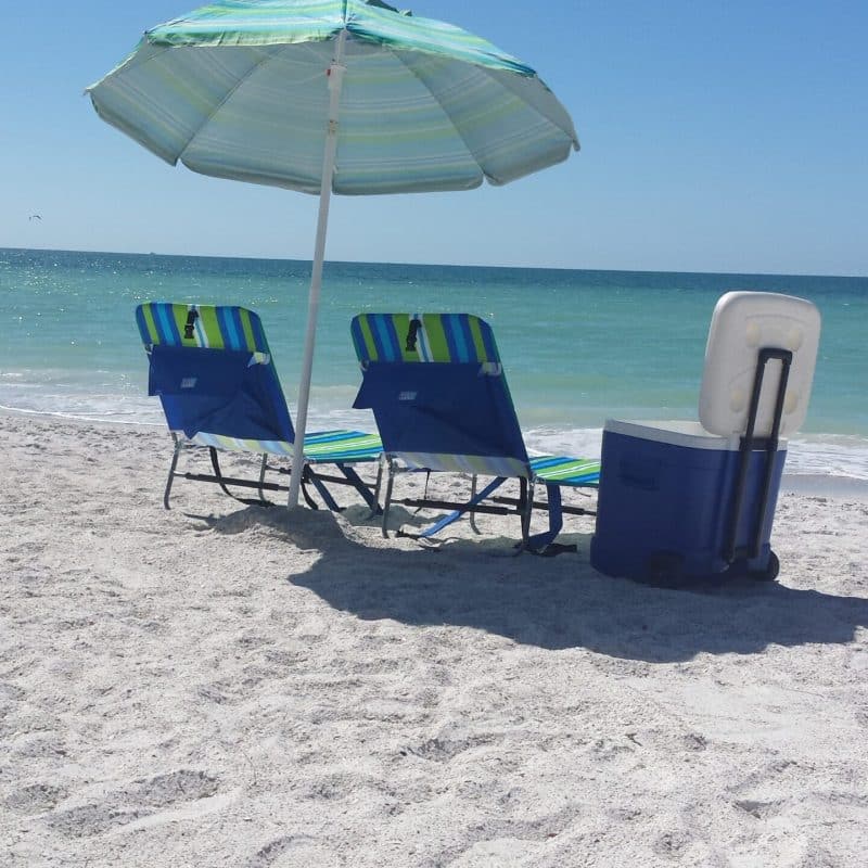 Umbrella 2 Chairs Cooler and Bocce Ball at anna maria island beach