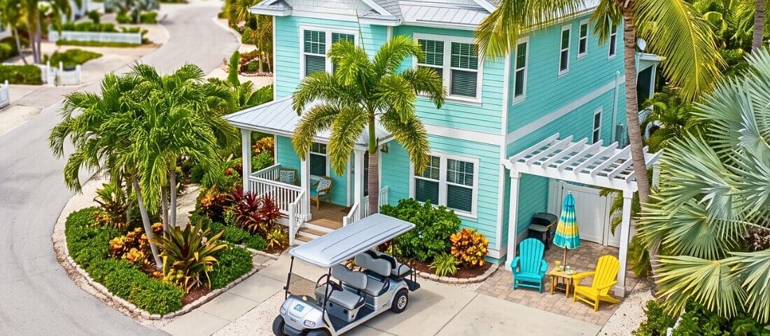 Gas golf cart parked at an Anna Maria Island vacation home during an extended coastal stay.